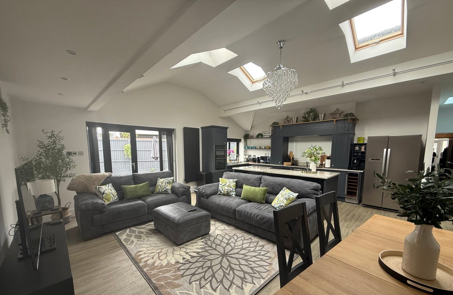 Open-plan lounge and kitchen at Birkdale Links Lodge
