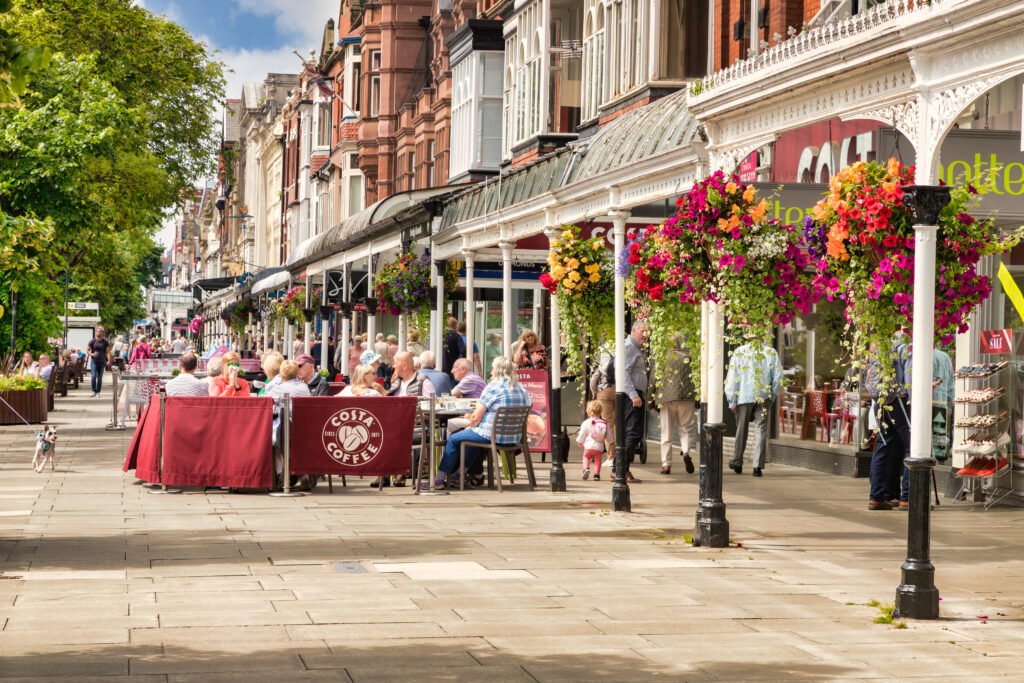 Cafes and flower displays along Lord Street in Southport