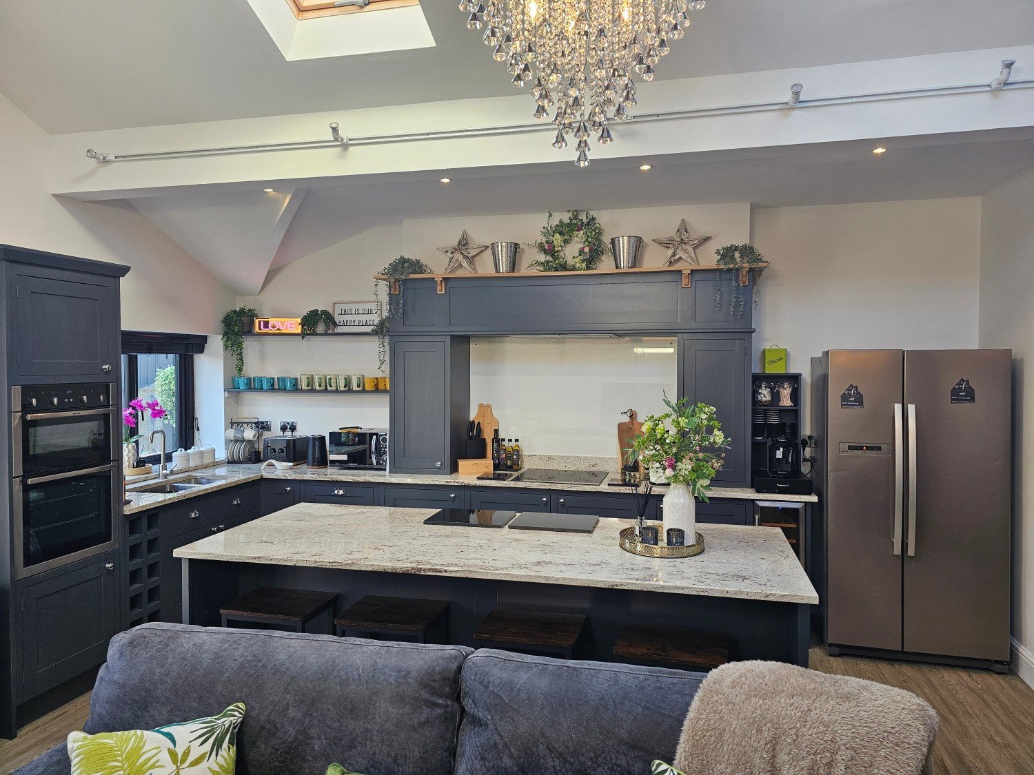 Modern kitchen and island at Birkdale Links Lodge